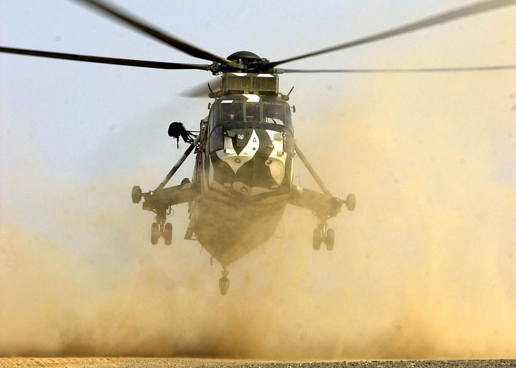 military-helicopter-dusty-landing